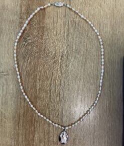 Rice Pearl Necklace With A Silver And Mother Of Pearl Pendant