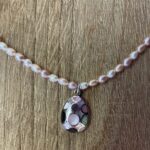 Rice Pearl Necklace With A Silver And Mother Of Pearl Pendant