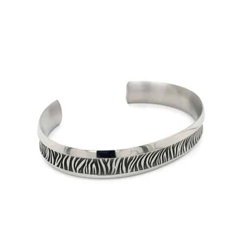 Titanium zebra concave bangle